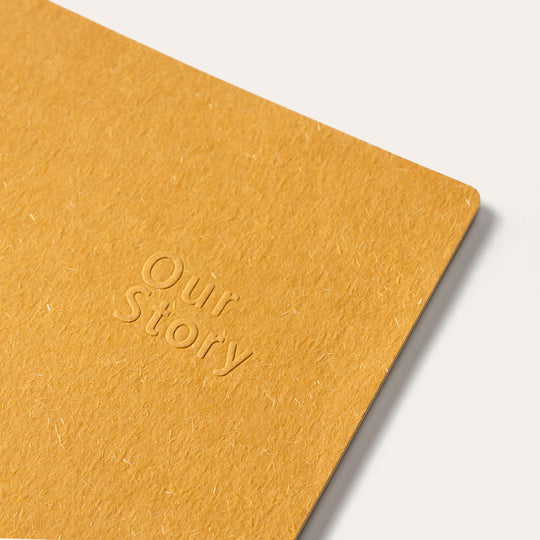 Amber Fields large beige lined notebook angled cover view – premium journal for writing