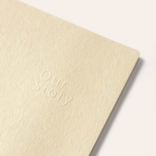 Amber Fields large pure white lined notebook angled cover view – premium journal for writing